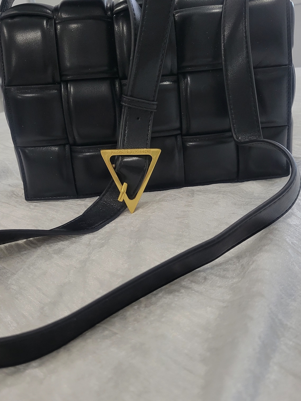Black Quilted Crossbody Bag with Gold Triangle Buckle